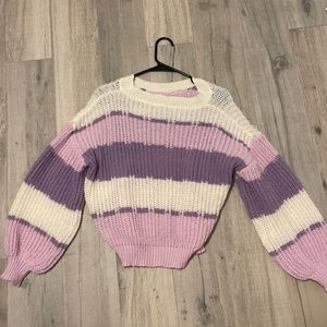 White and purple sweater